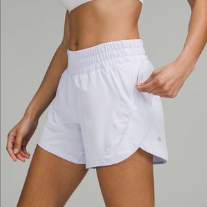 Lululemon track that mid rise short 5 inch size 4 pastel blue